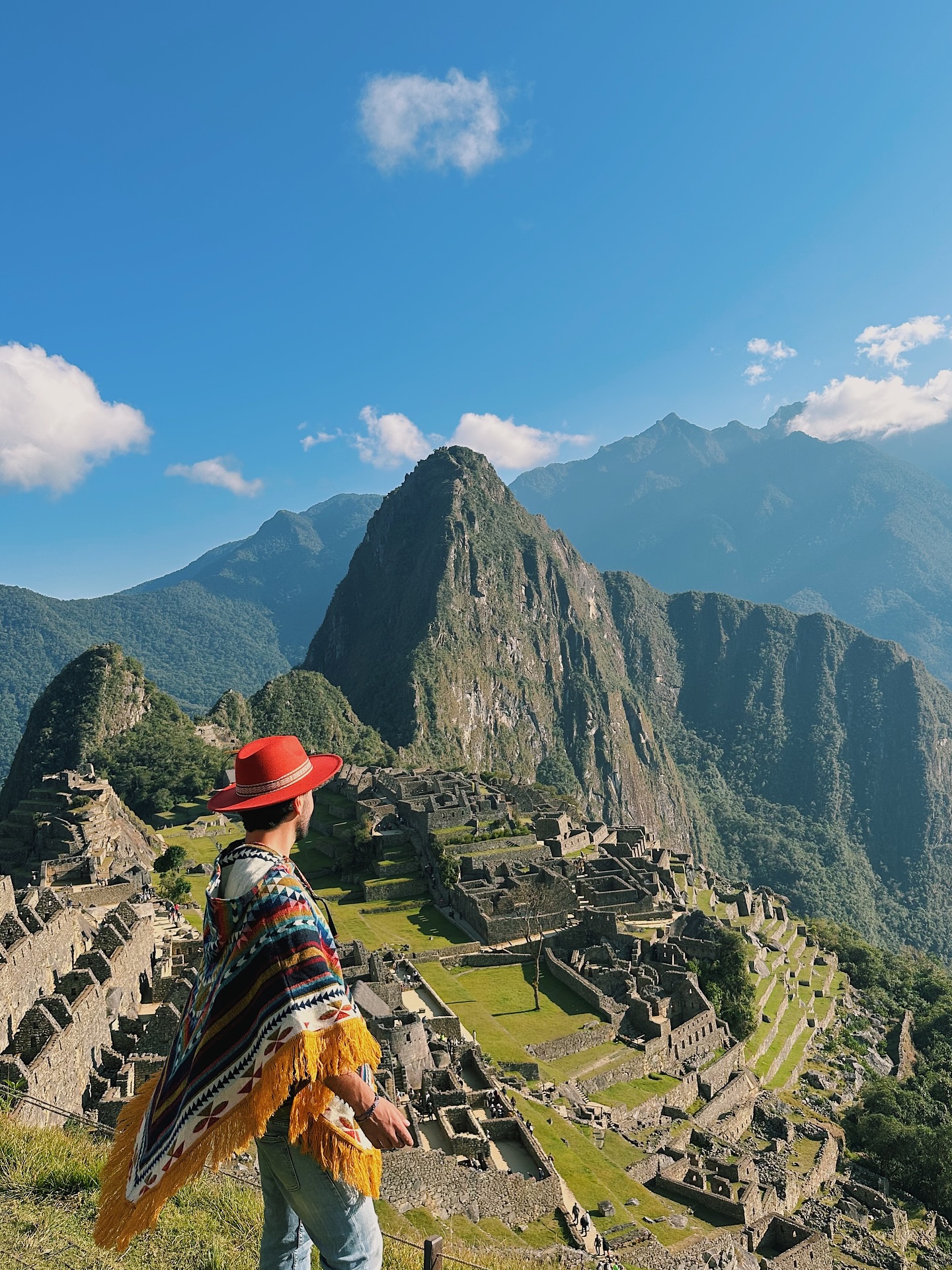 Panoramic view of Machu Picchu citadel with Huayna Picchu mountain background